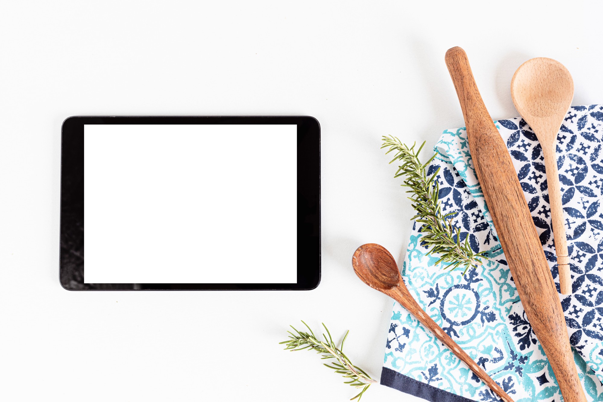 Flat lay of cooked dishes and laptop for online course